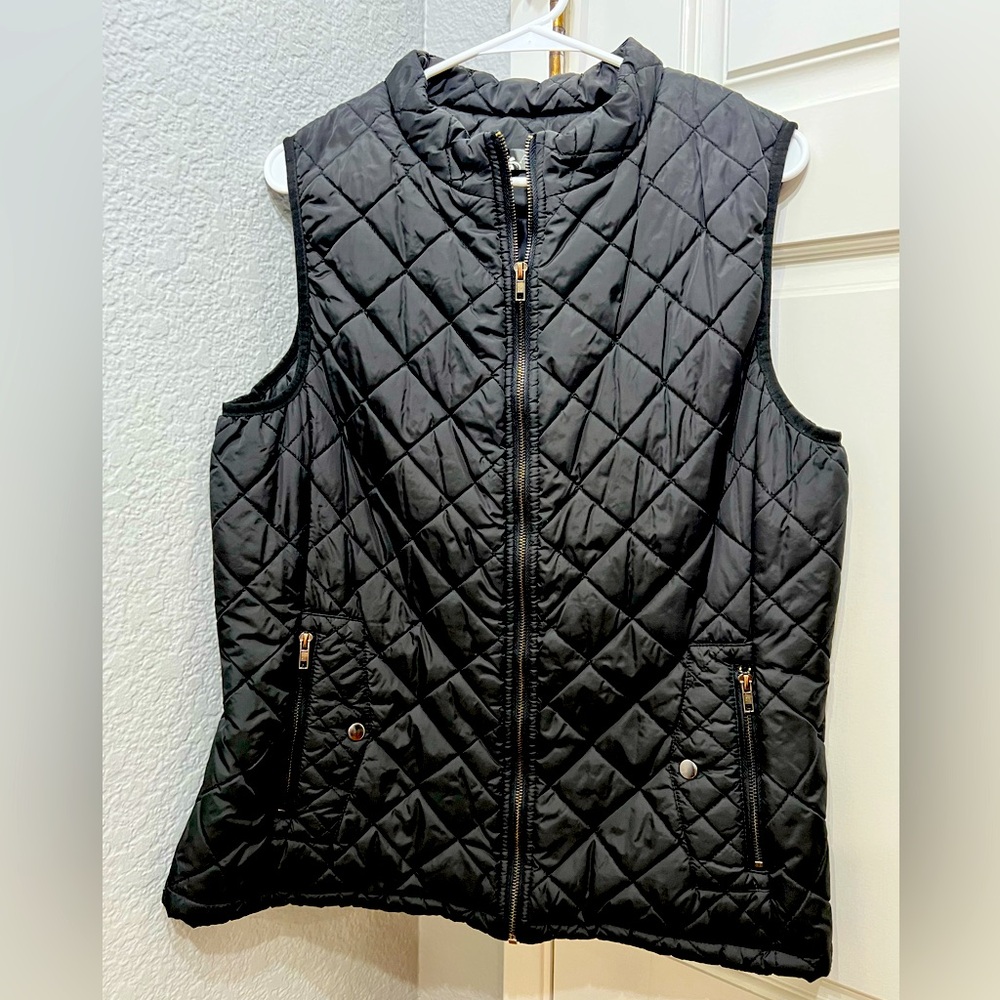 Black quilted zip vest